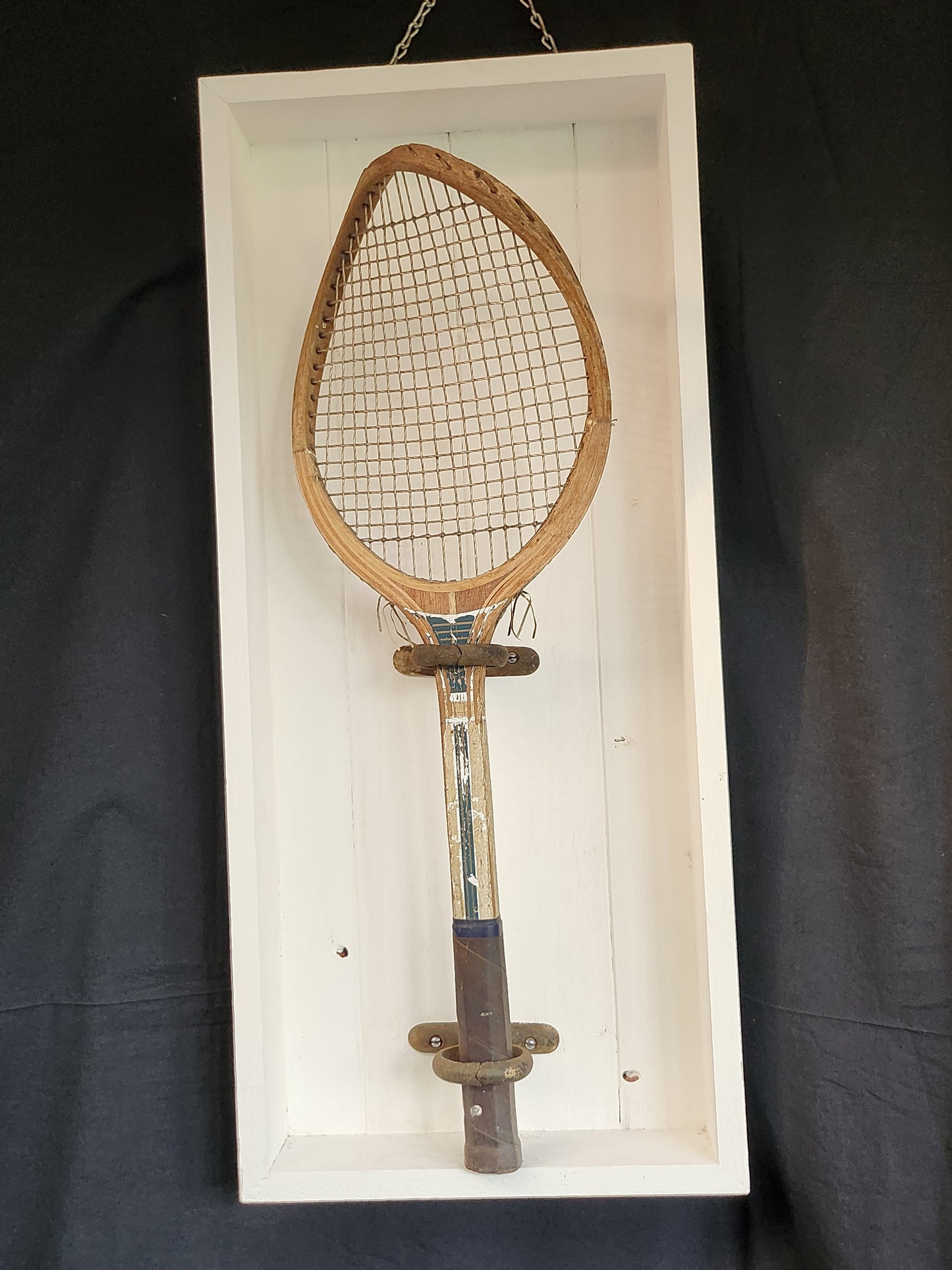 Distressed tennis raquet